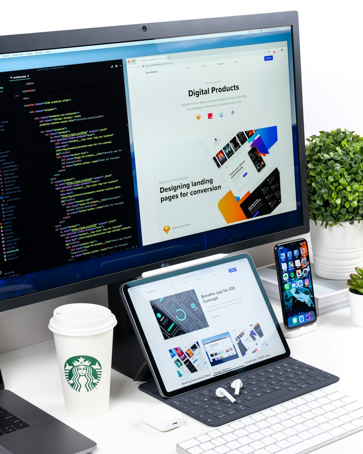 http://Desk%20setup%20showing%20web%20application%20code%20and%20a%20live%20website%20design